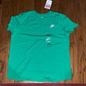 Women’s green Nike shirt